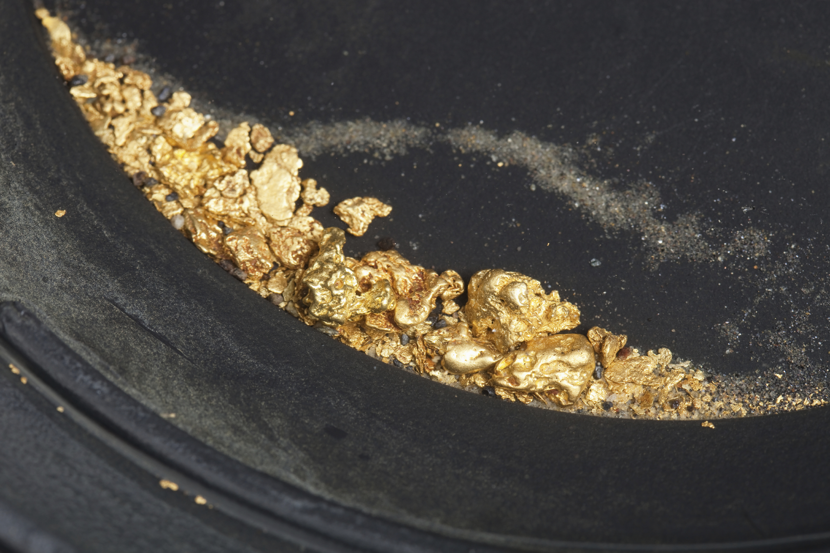 Gold at the bottom of a pan